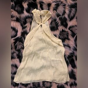 Bright yellow halter neck blouse